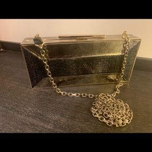 Chelsboxclutch iridescent/metallic leather.